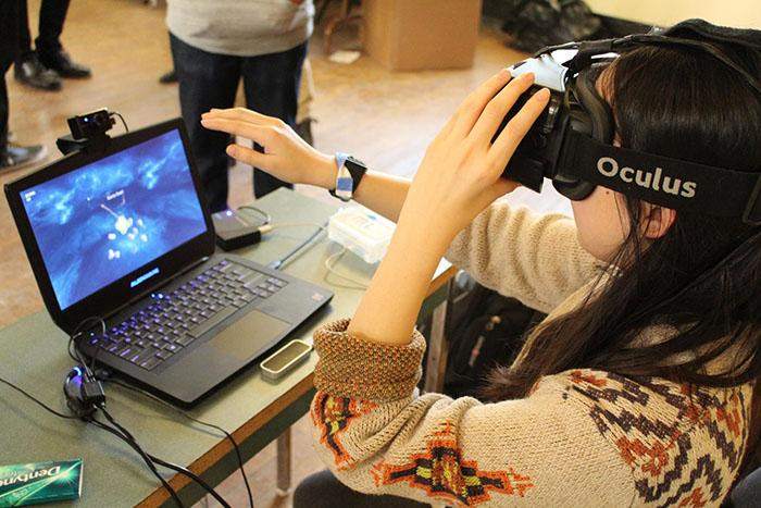  Playing Space Invader in VR on the Oculus Rift, image credited to Rui Jie Wang.