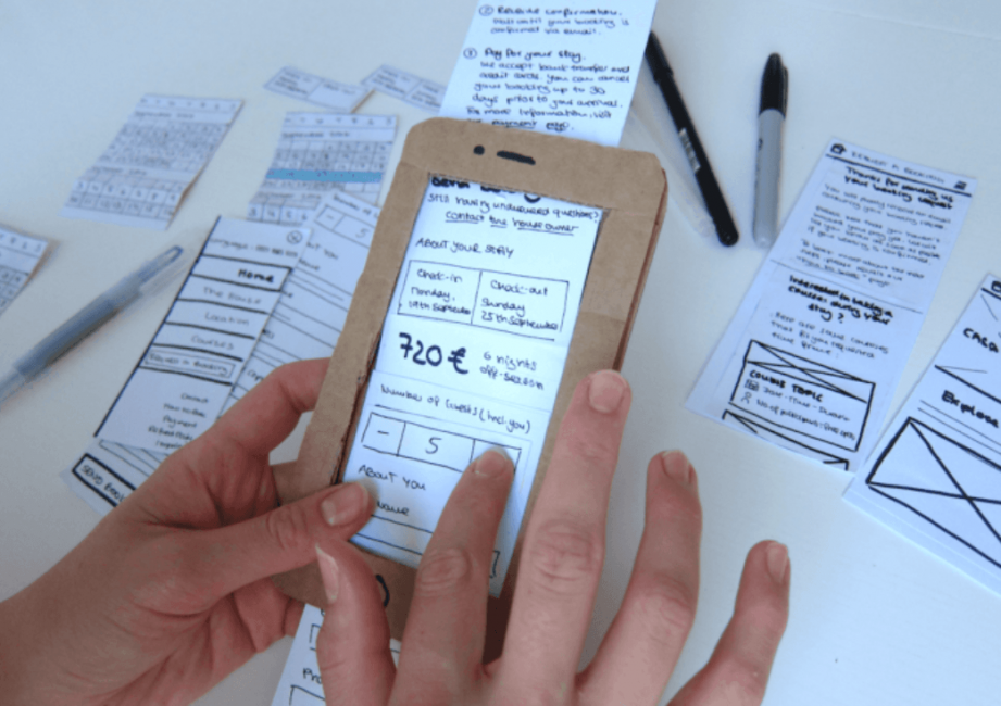 Designers paper prototype of a mobile app