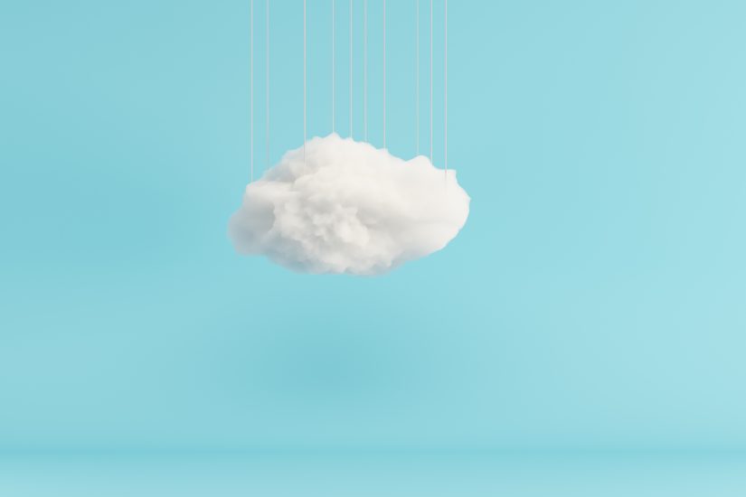 Image of a white 3D cloud in front of a solid blue background