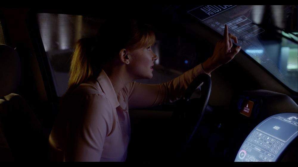 An actress In the Black Mirror Episode, Nosedive, interacts with an FUI in the form of a vehicle's HUD that is not visible during the filming of the scene.