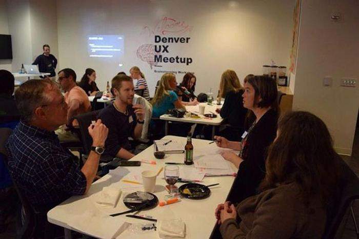  Image of UX designers at a meetup in Denver.