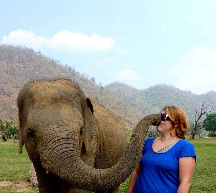  Amy Thibodeau visiting an elephant refuge in Thailand, taken during her year of travel before joining Facebook.