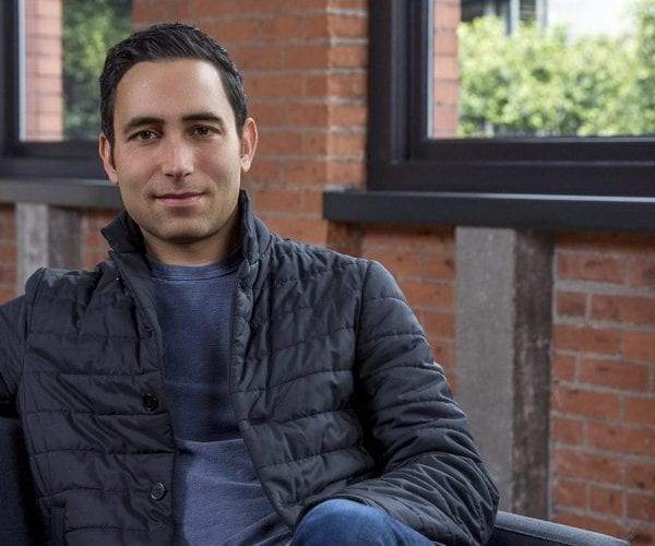 Scott Belsky sitting in chair