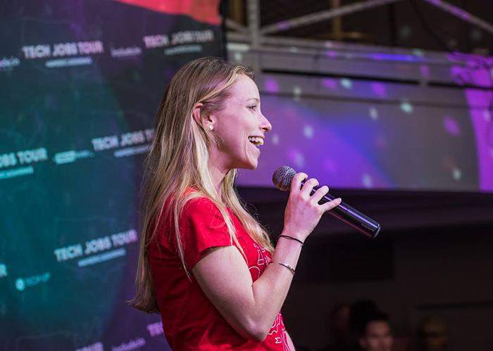 Side profile of Danielle Barnes speaking at the Tech Jobs Tour at SXSW in 2017.