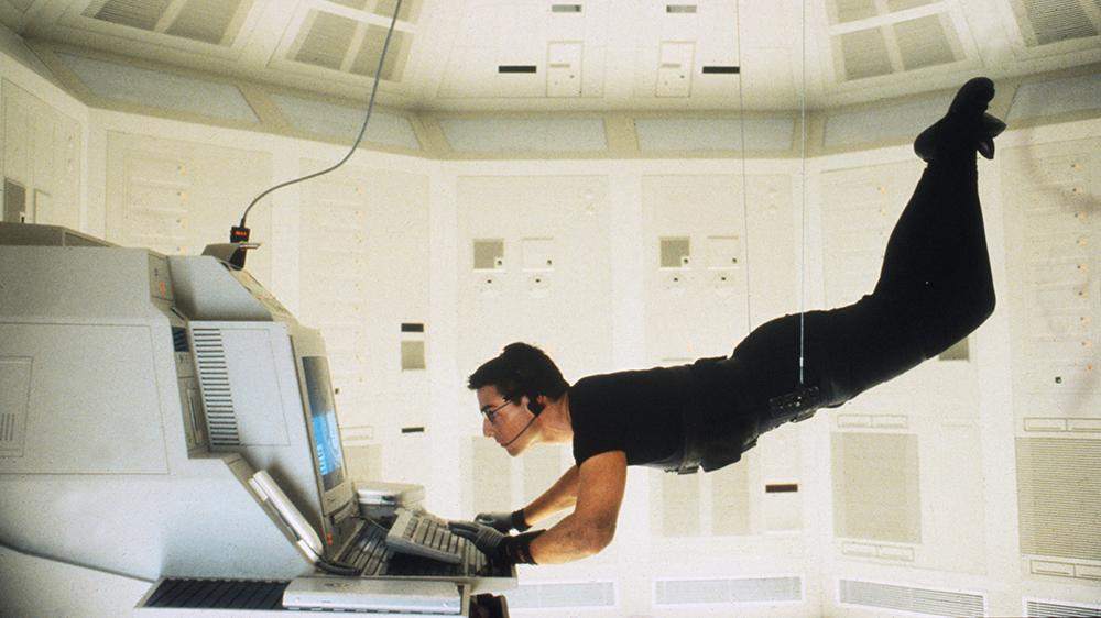 The laser descent scene from 1995's Mission Impossible.