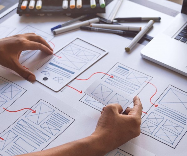 ux Graphic designer creative sketch planning application process development prototype wireframe for web mobile phone . User experience concept.