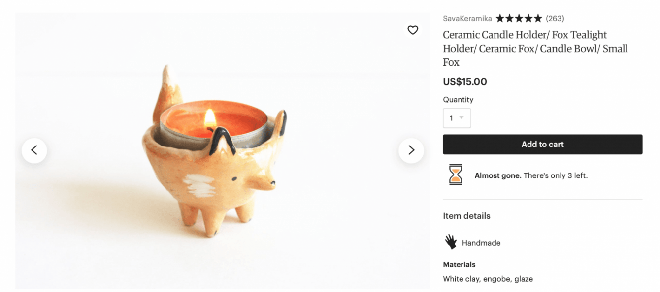 A screenshot of a ceramic candle holder from Etsy