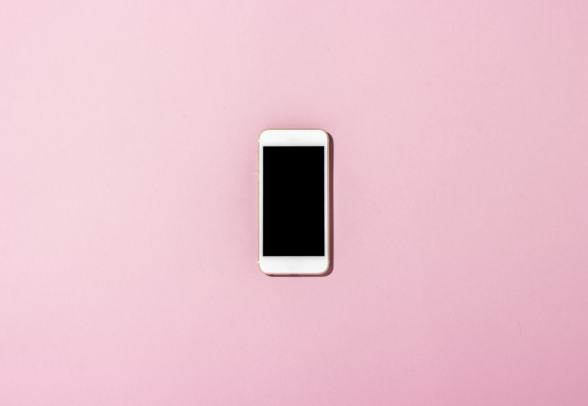 iphone on a pink background