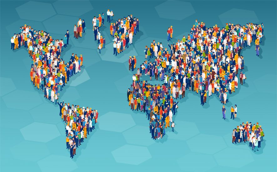 Large, diverse groups of people stand together to form the continents of the world.