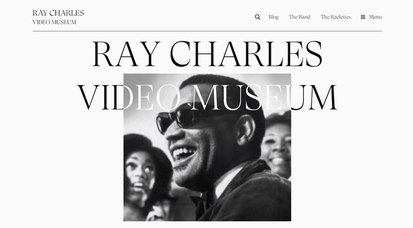 Text is centered over a black and white image of Ray Charles.