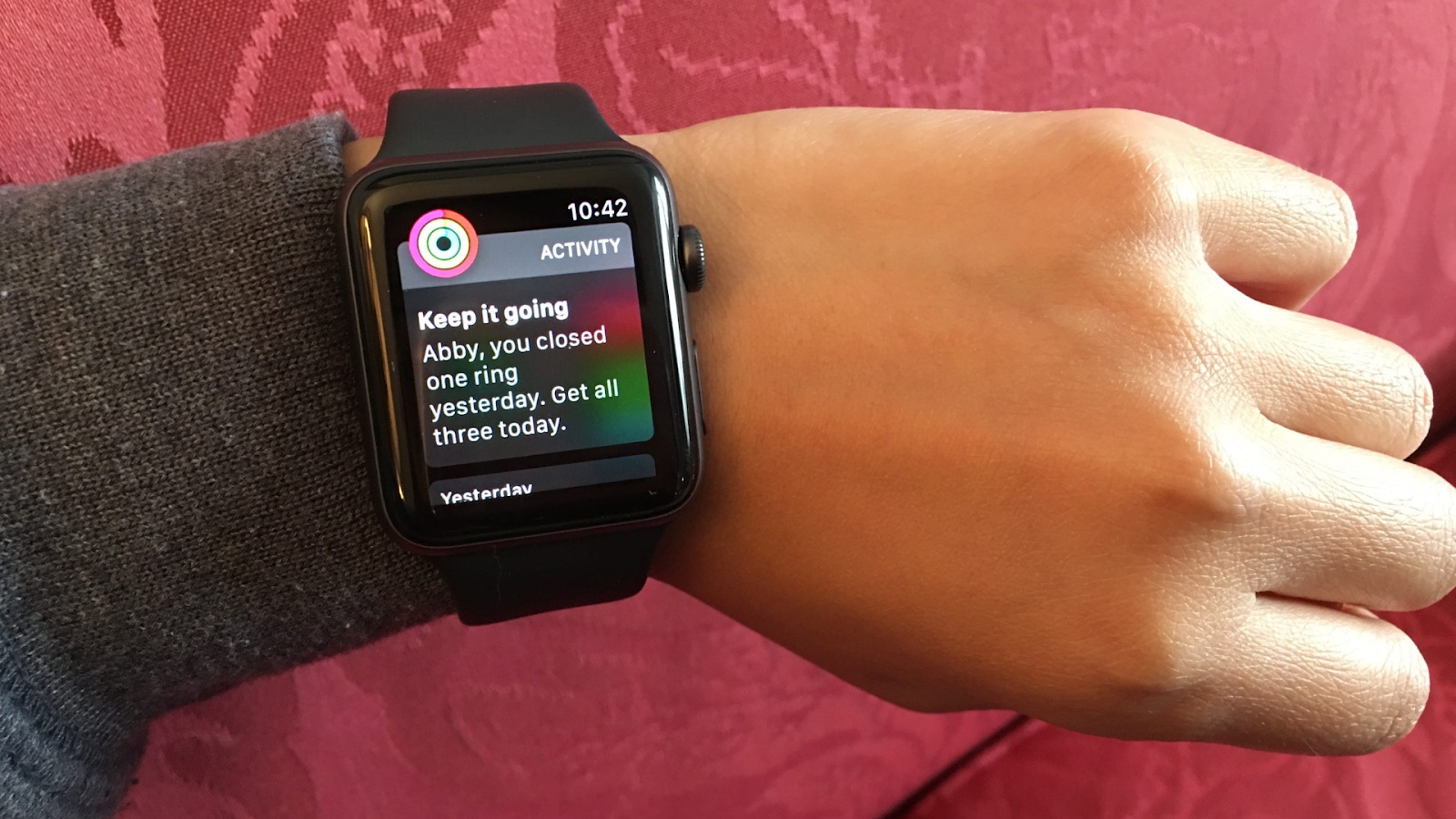 A smartwatch notification for a user-defined activity goal.