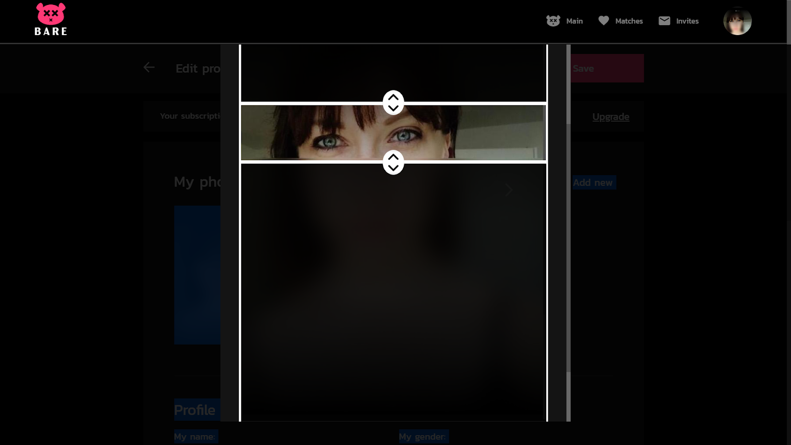 Desktop interface of dating app site. Cropped photograph of woman's eyes.