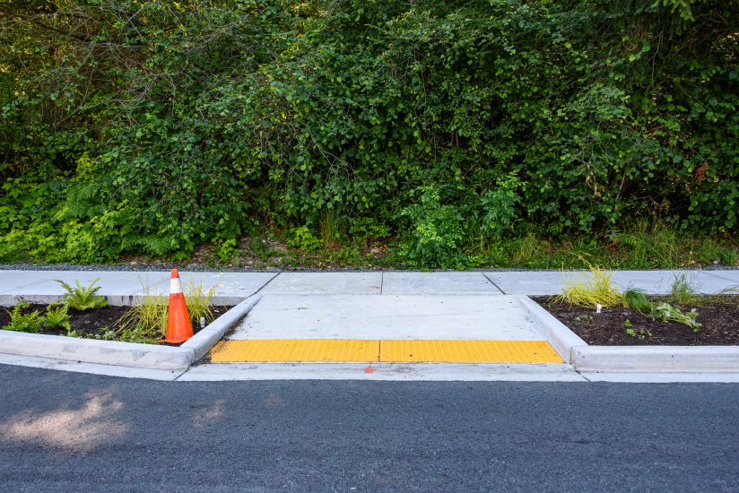A classic example of universal design is a ramp designed for wheelchair users to navigate from street to sidewalk. Image credit Adobe. 